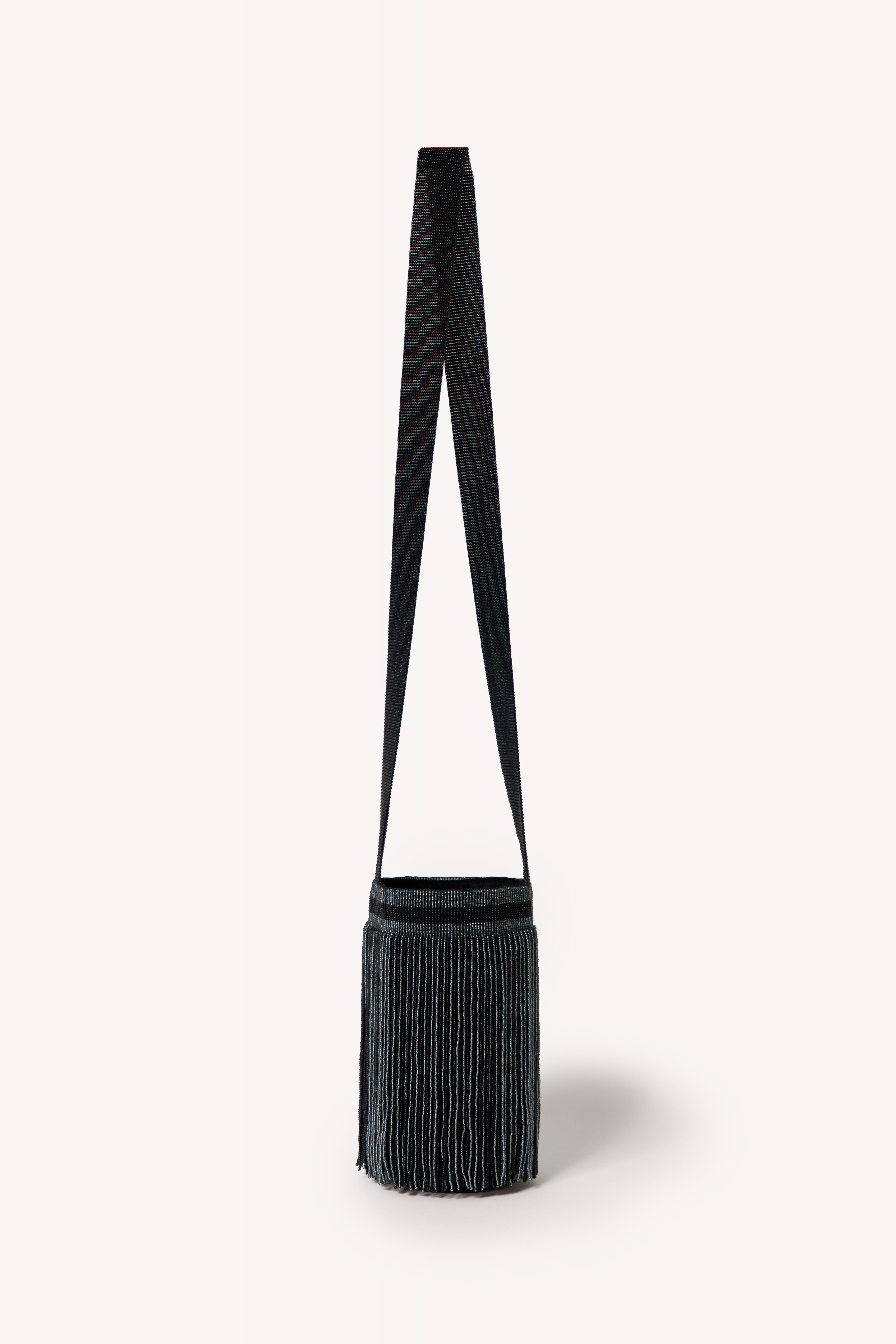 Betsá Fringe Mochila Bag on a neutral background.