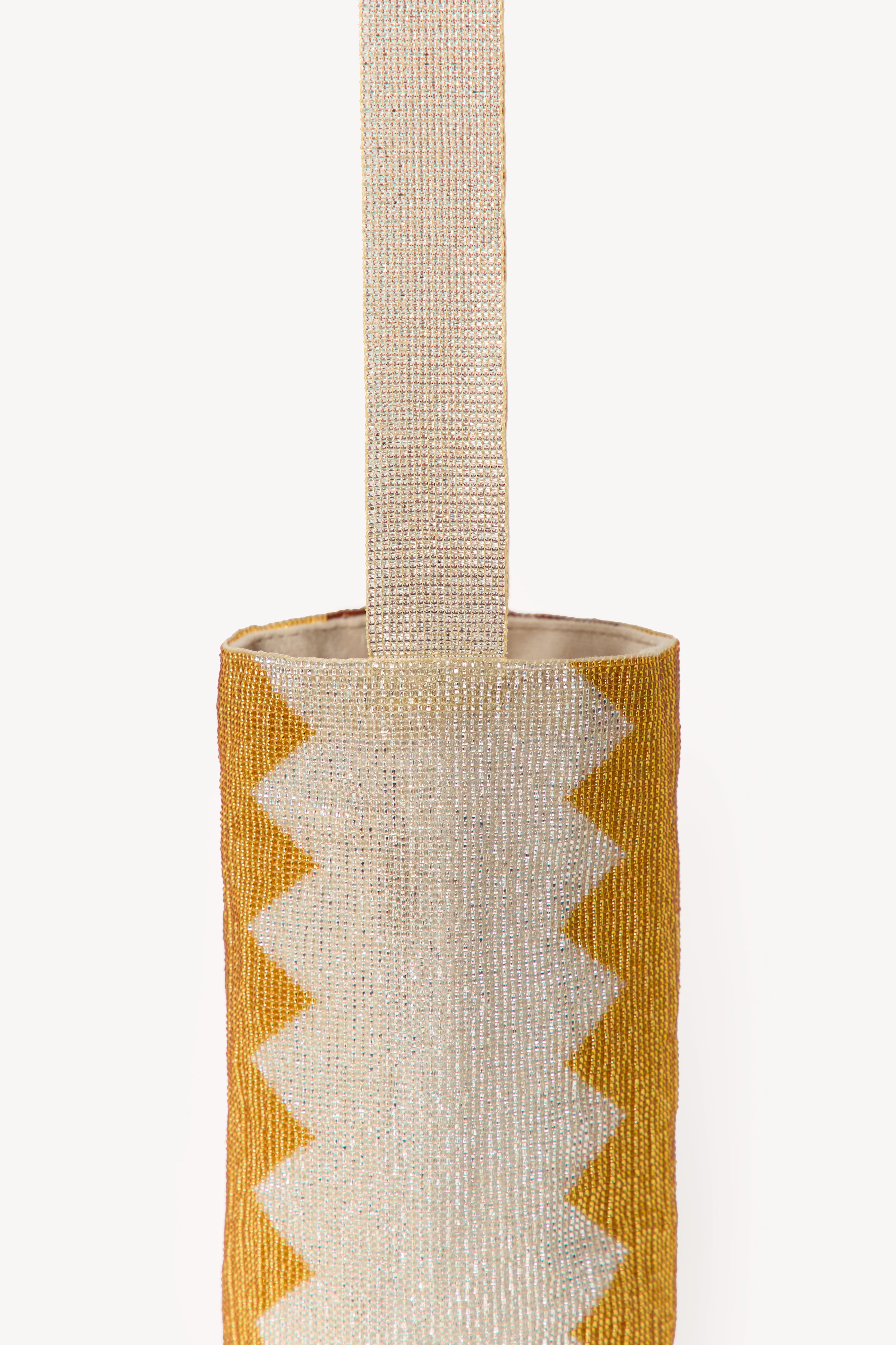 Betsá Zigzag Mochila Bag on a neutral background