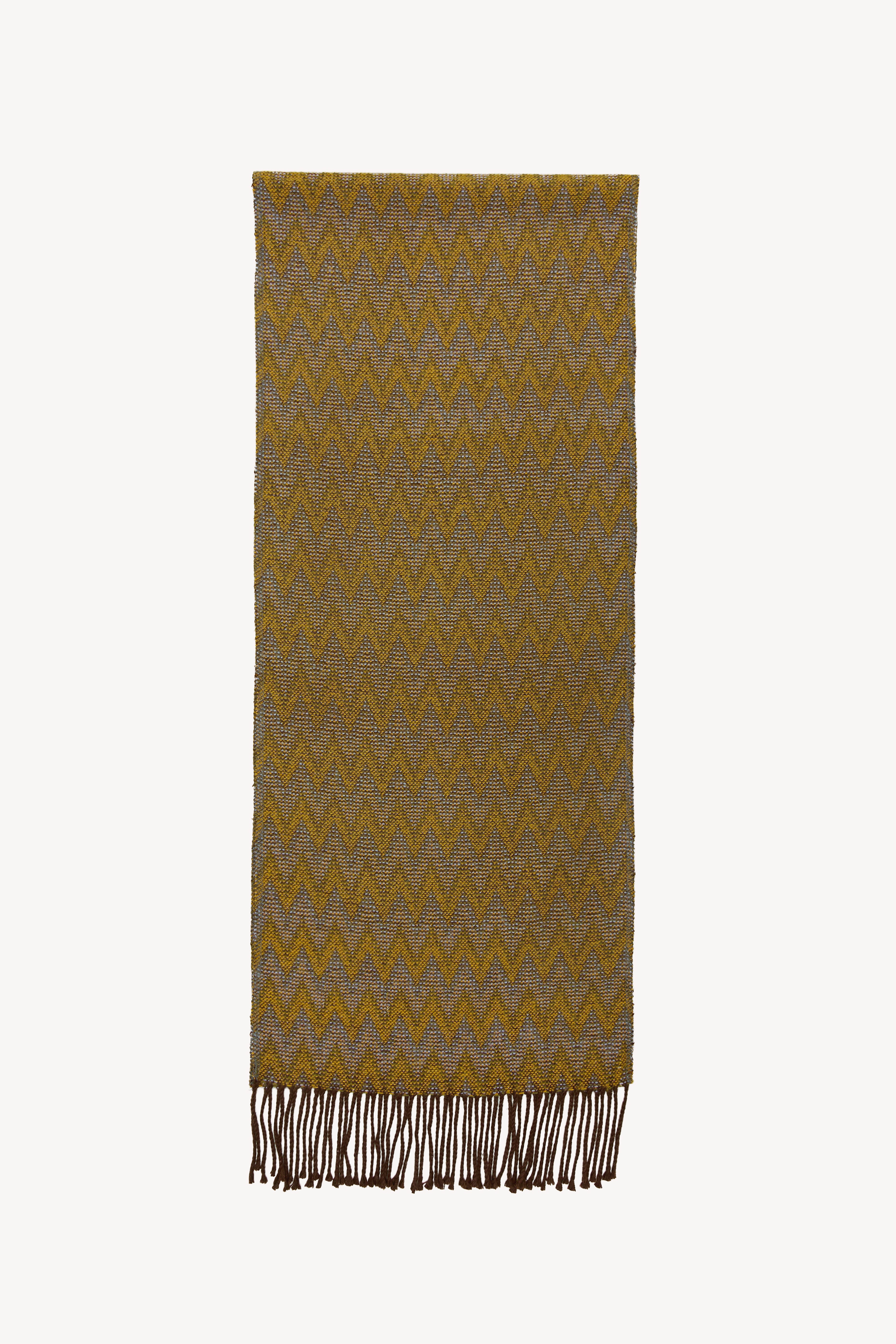 Handmade Wayra Scarf on a neutral background