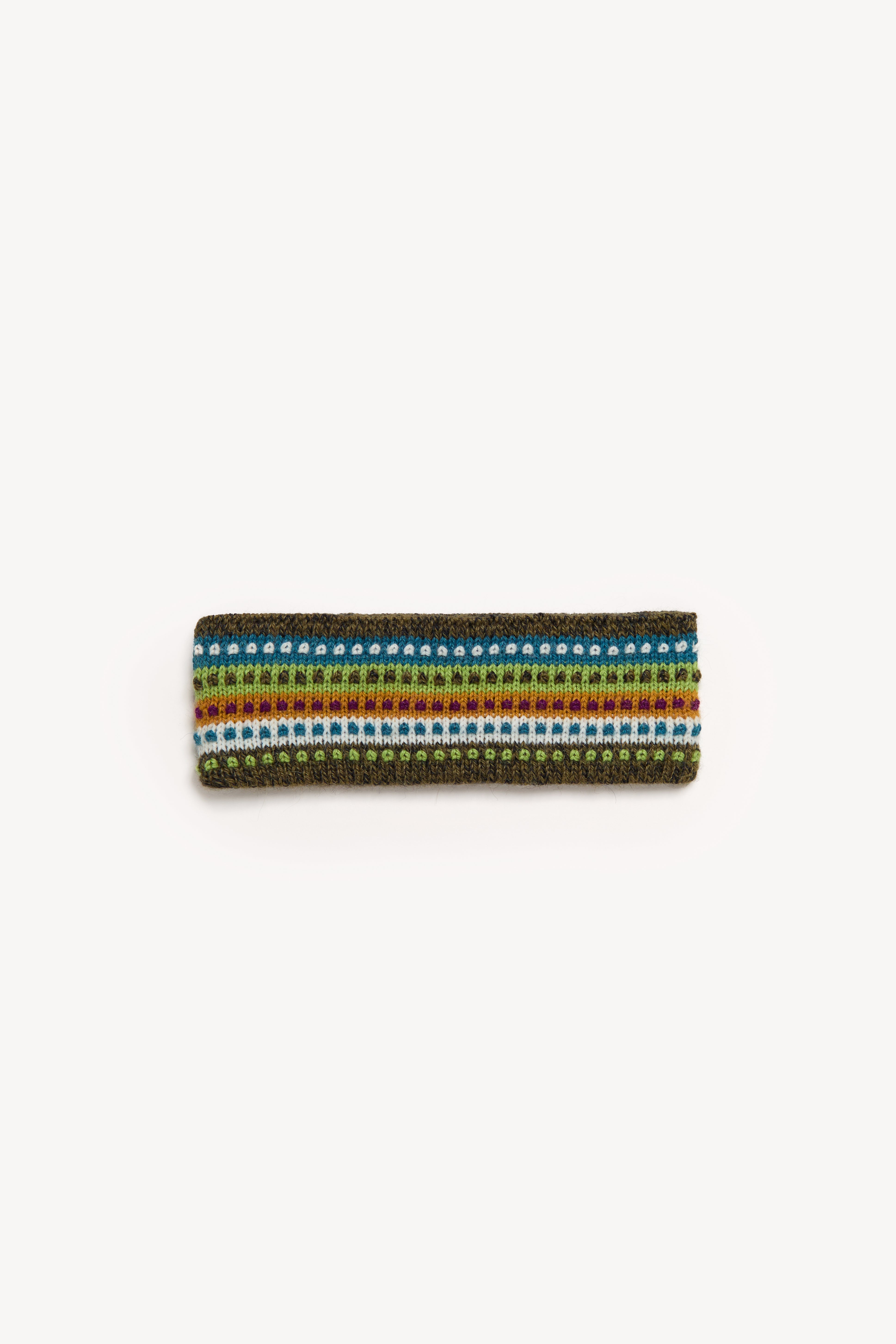 Handmade multicolor headbands displayed on a neutral background