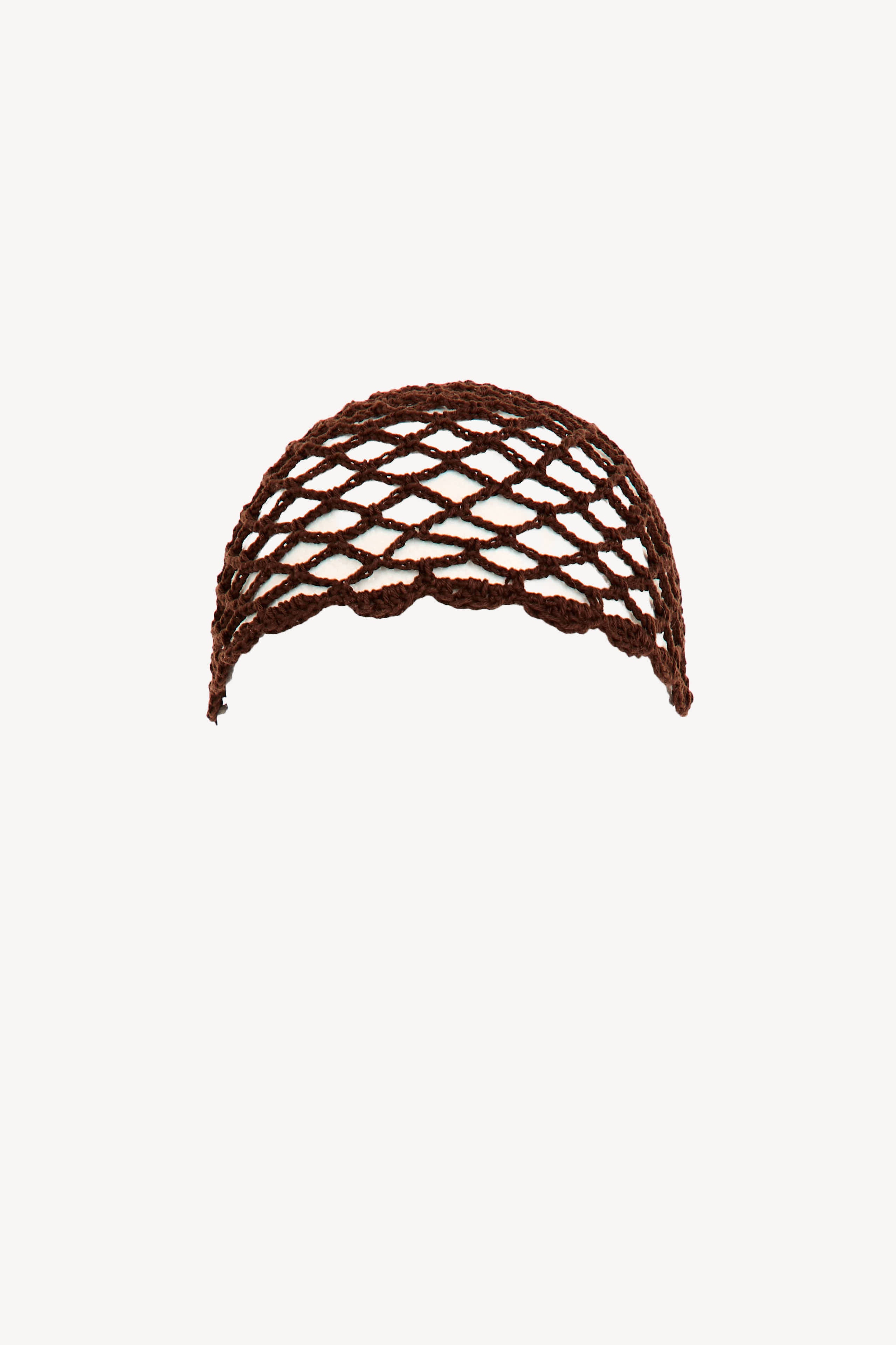 Hand-crocheted brown cotton cap with open net design, handmade in Ecuador.