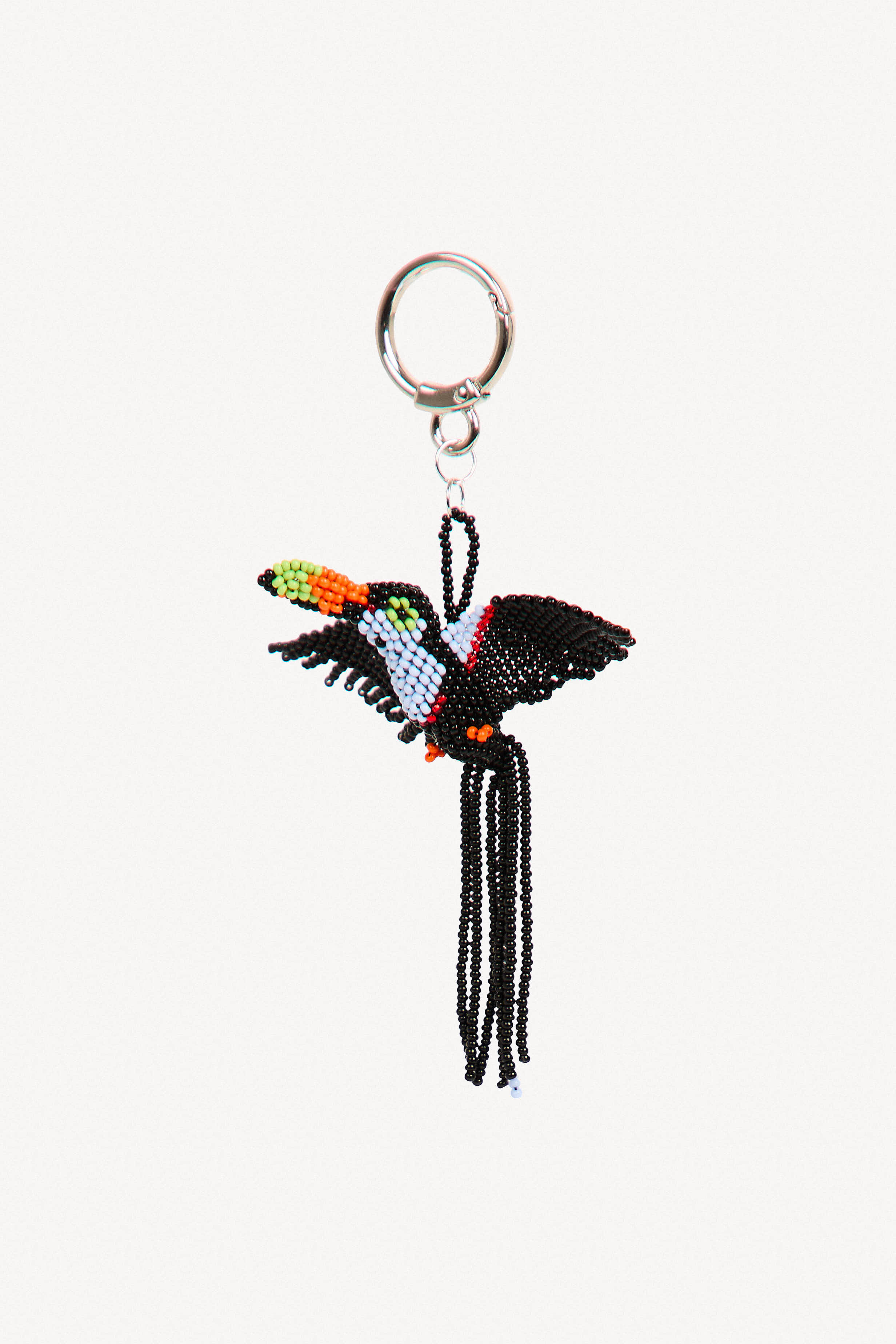 Beaded toucan charm used as keychain or clipped onto bag