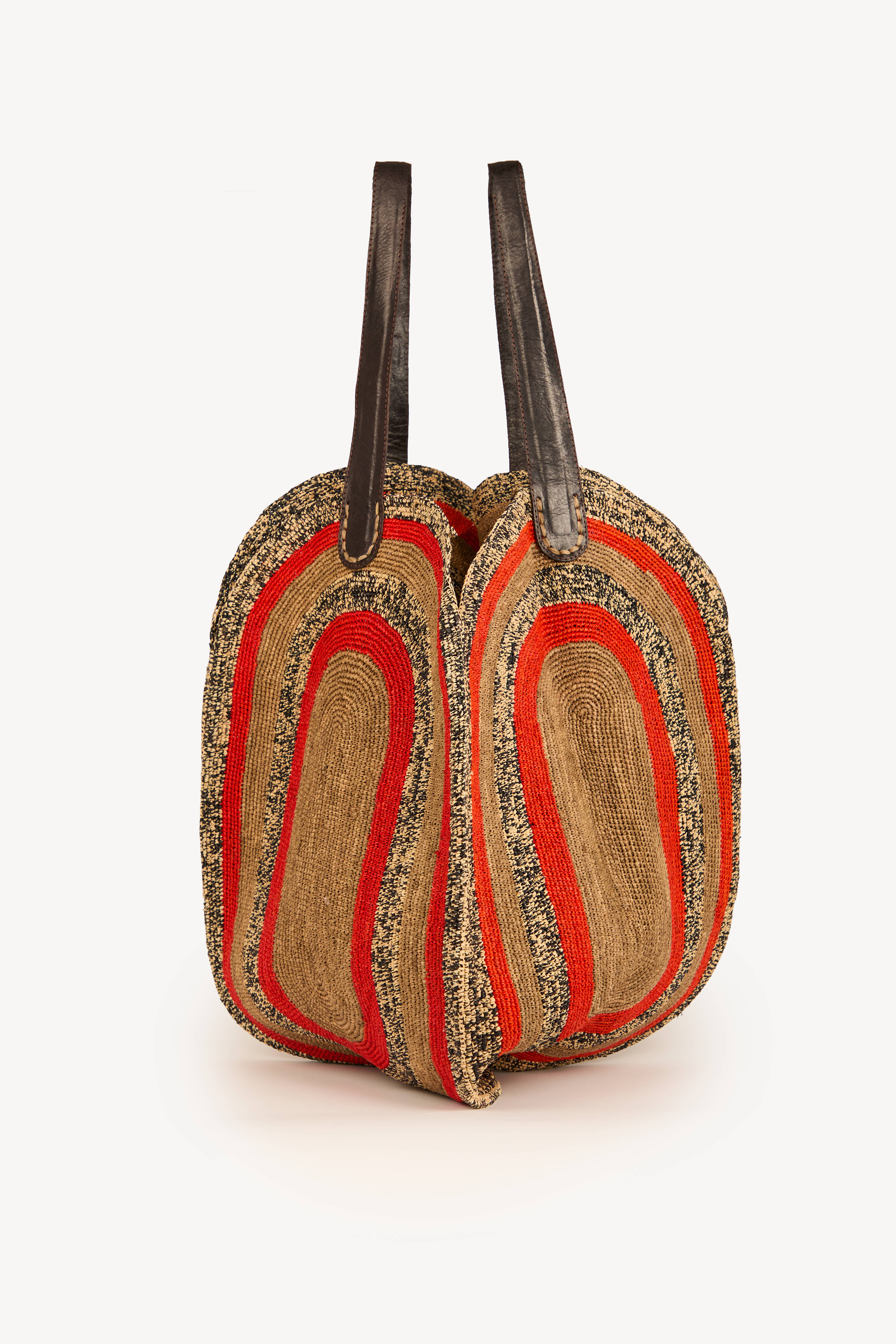 Maxi raffia tote bag with spacious shape and leather straps, handmade in Madagascar