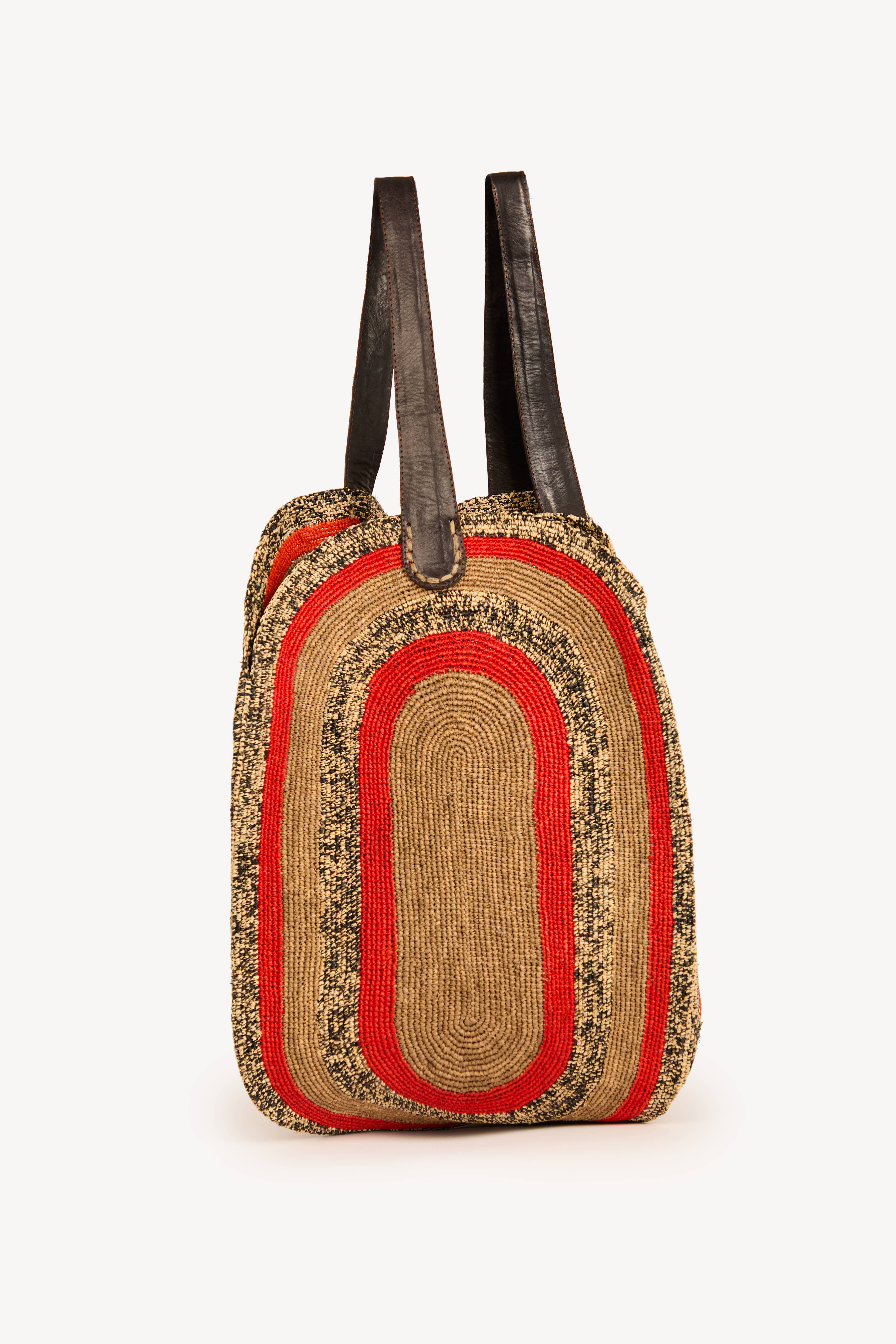 Handwoven maxi raffia tote bag with leather handles, handmade in Madagascar.