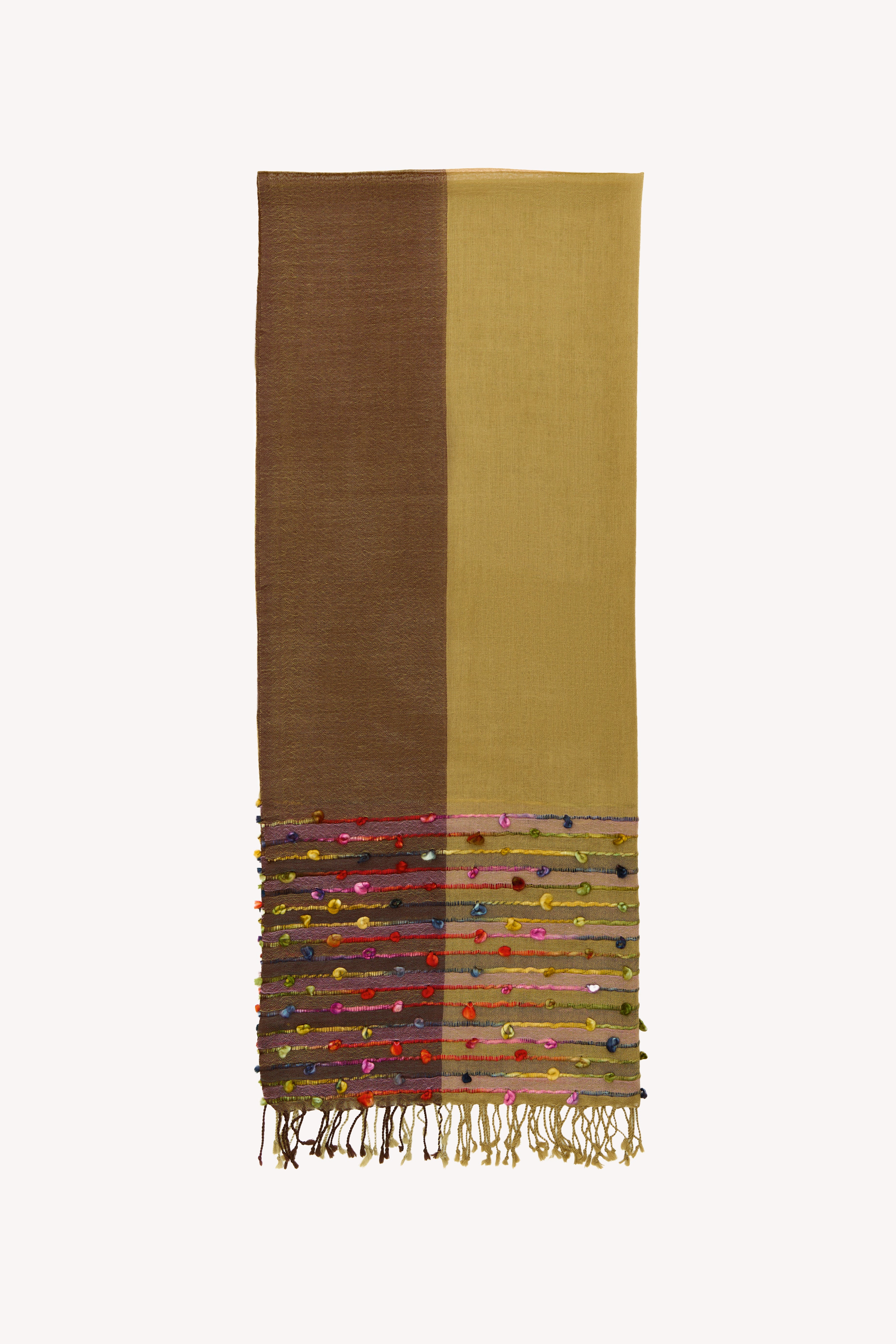 Colorful handcrafted scarf on a neutral background.