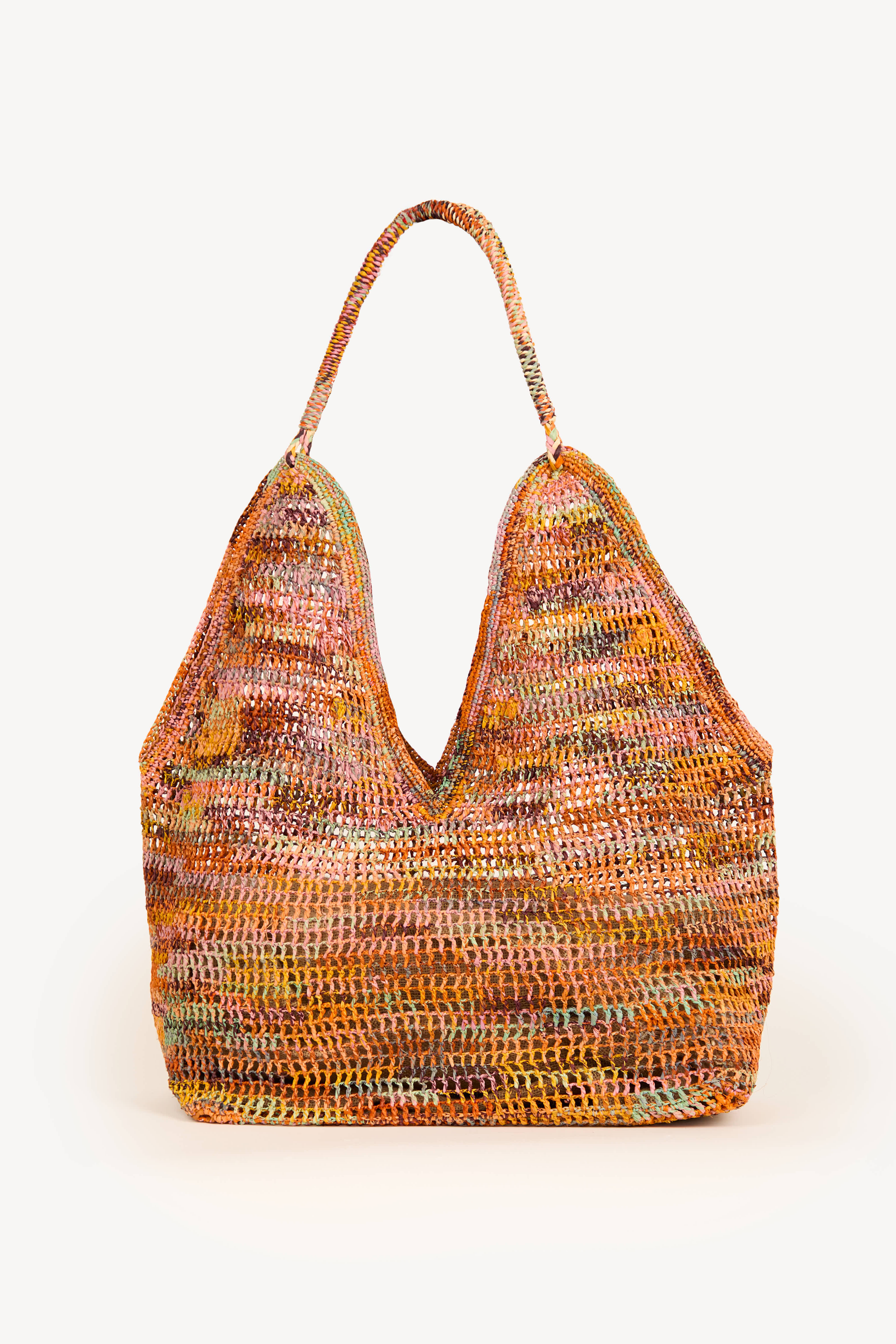 Handwoven raffia shoulder tote with soft structure, handmade in Madagascar.